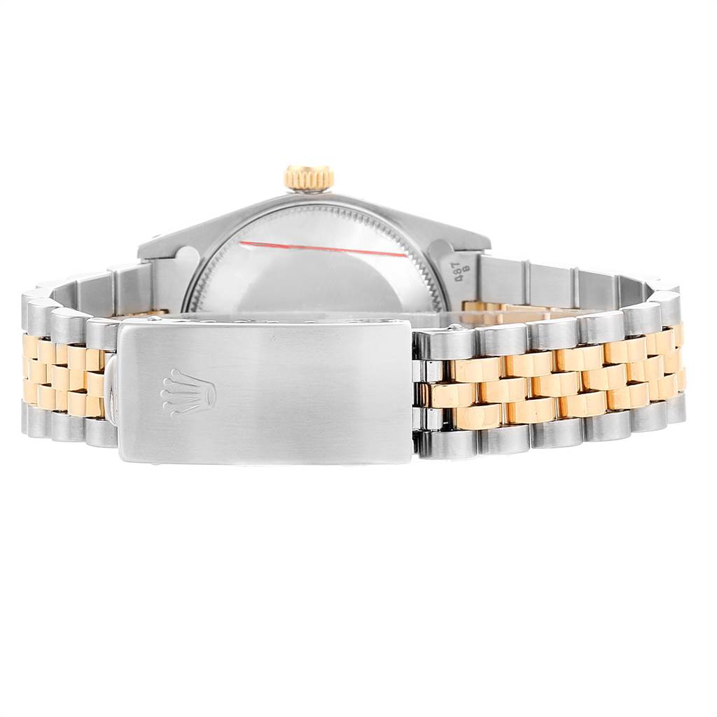 This image shows the rear view of a Rolex Mid-Size 68273 Women's Steel and Gold (two tone) Beige Dial 68273 Women's Steel and Gold (two tone) Beige Dial model watch, highlighting its clasp and bracelet.