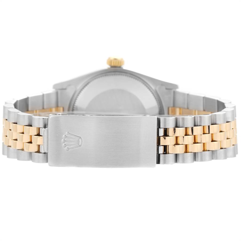 The image shows the back view of a Mid-Size Rolex watch, focusing on the bracelet and clasp.