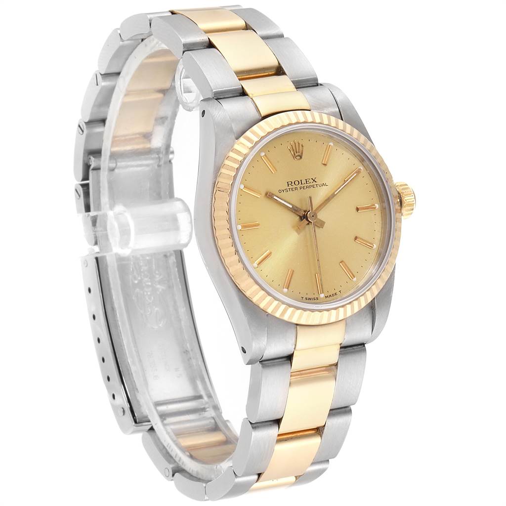 The Rolex Mid-Size 67513 Women's Steel and Gold (two tone) Champagne Dial 67513 Women's Steel and Gold (two tone) Champagne Dial Oyster Perpetual watch is shown at a three-quarter angle, displaying the gold and silver bracelet and gold dial.