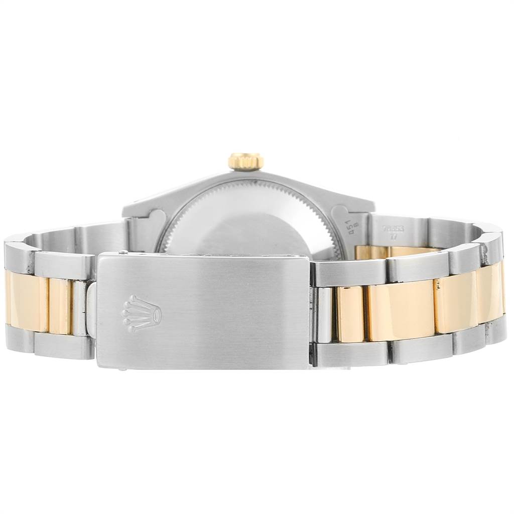 The image shows the back view of a Mid-Size Rolex watch's clasp and bracelet, highlighting the two-tone metal design.