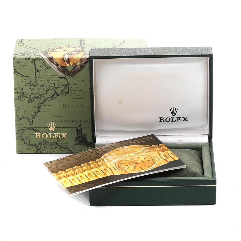 The image shows the packaging and manuals for a Mid-Size Rolex watch, but the watch itself is not visible.