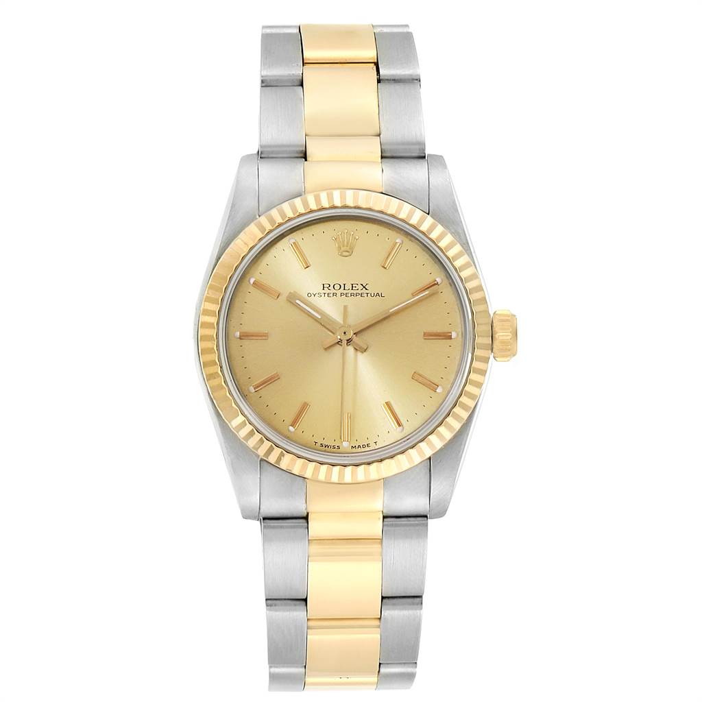 The image shows a front view of a Rolex Mid-Size 67513 Women's Steel and Gold (two tone) Champagne Dial 67513 Women's Steel and Gold (two tone) Champagne Dial Oyster Perpetual watch displaying the dial, bezel, and bracelet.