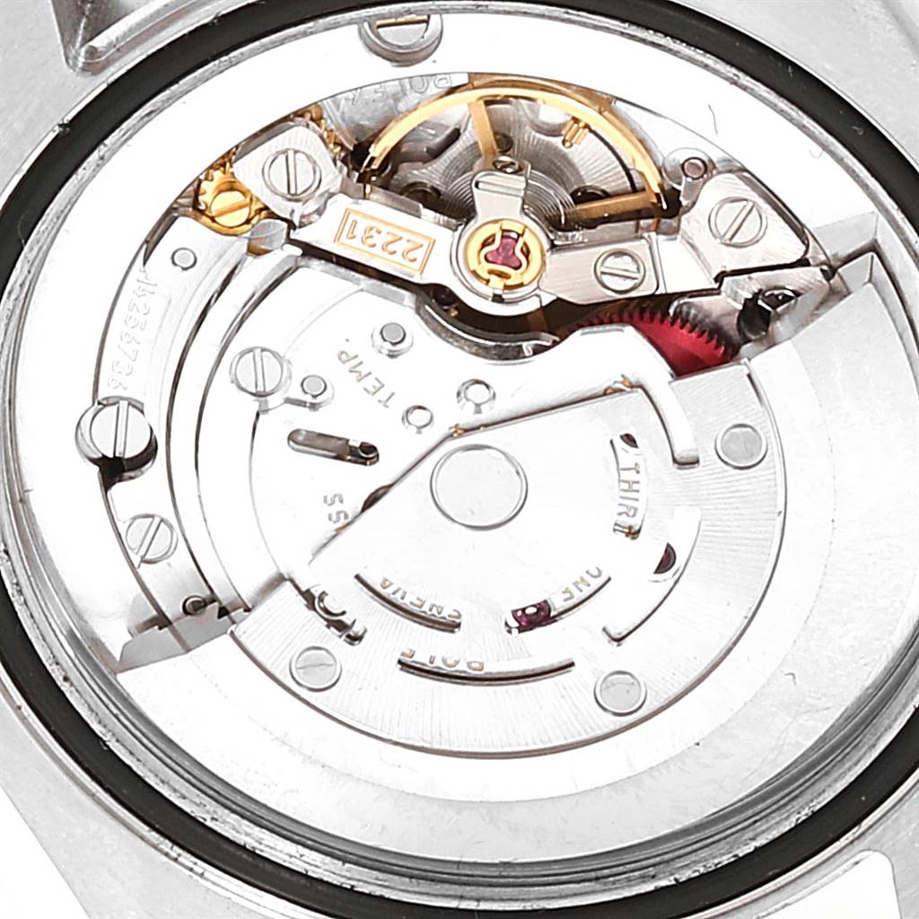 The image shows the detailed movement of the Mid-Size Rolex watch viewed from the back.