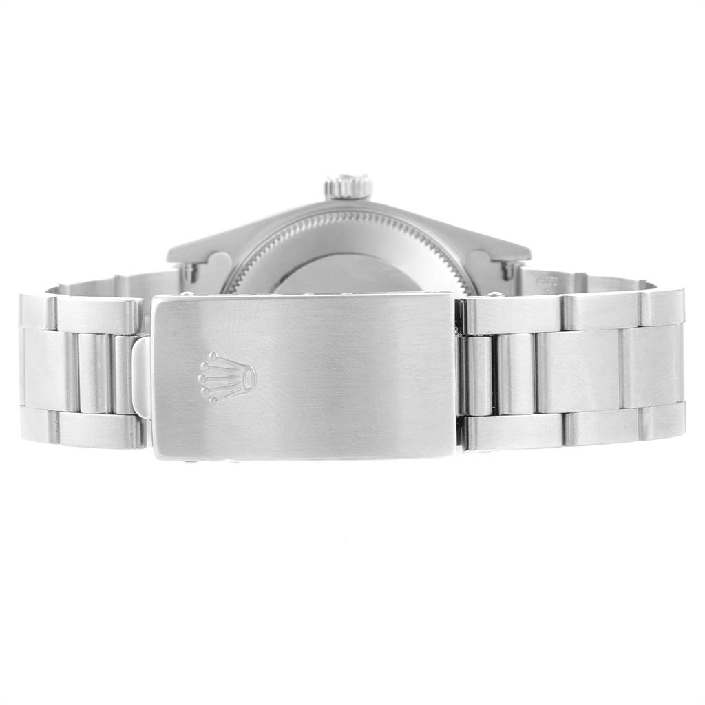This Mid-Size Rolex watch is shown from the back, displaying the bracelet and clasp with the Rolex logo.
