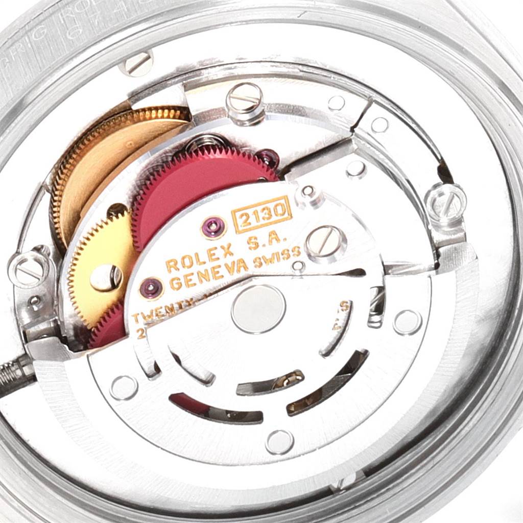 The image shows the internal mechanical parts of a Rolex Mid-Size 67480 Women's Stainless Steel Pink Dial 67480 Women's Stainless Steel Pink Dial model watch from a top-down angle.