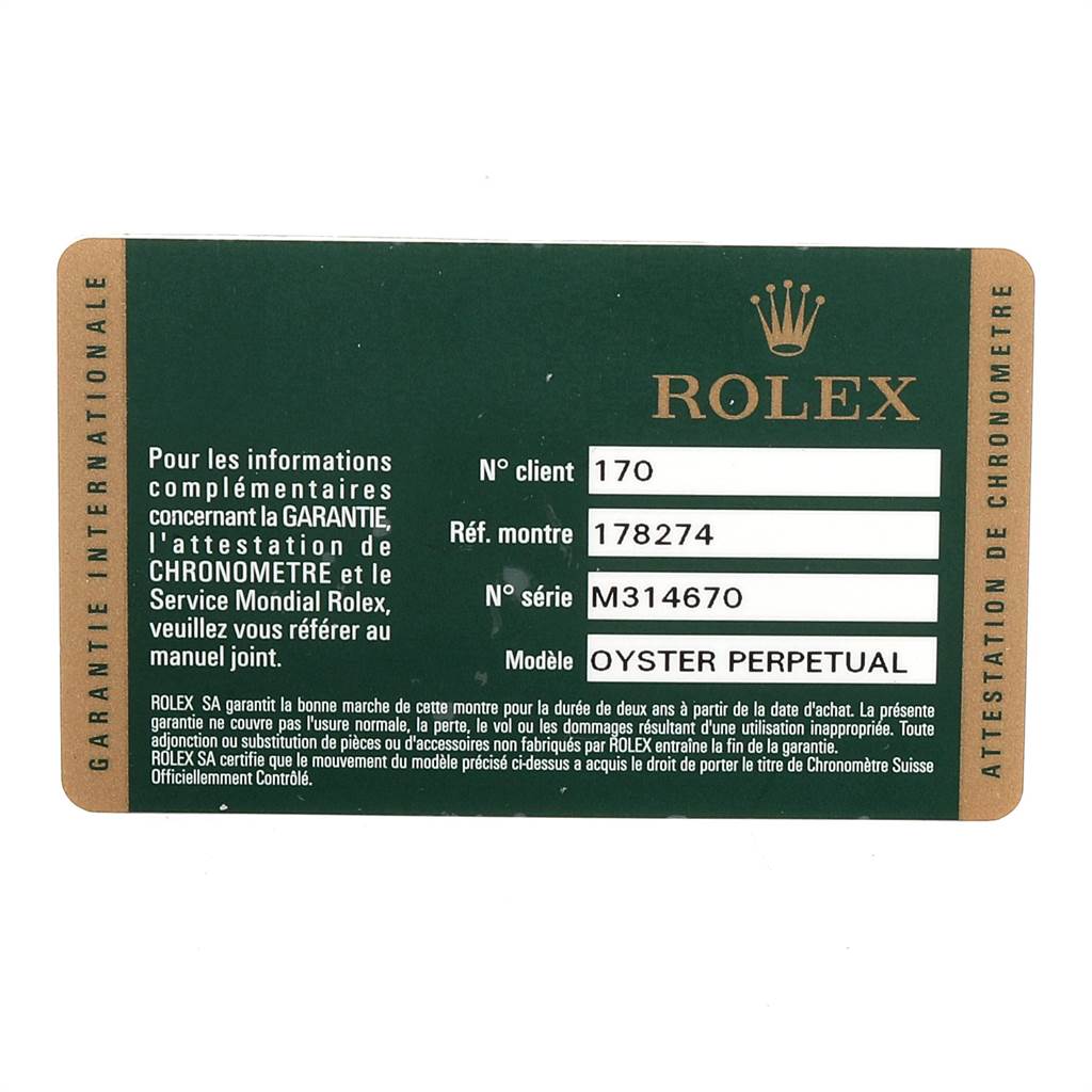 This image shows a warranty card for a Rolex Oyster Perpetual Mid-Size model.