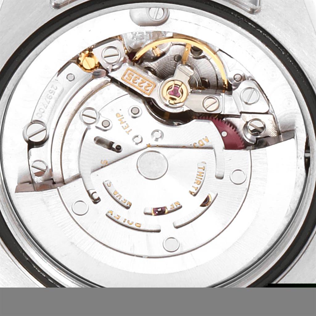 This image shows the movement and internal mechanism of a Rolex Mid-Size 178274 Women's Stainless Steel Silver Dial 178274 Women's Stainless Steel Silver Dial model from a close-up, angled view.