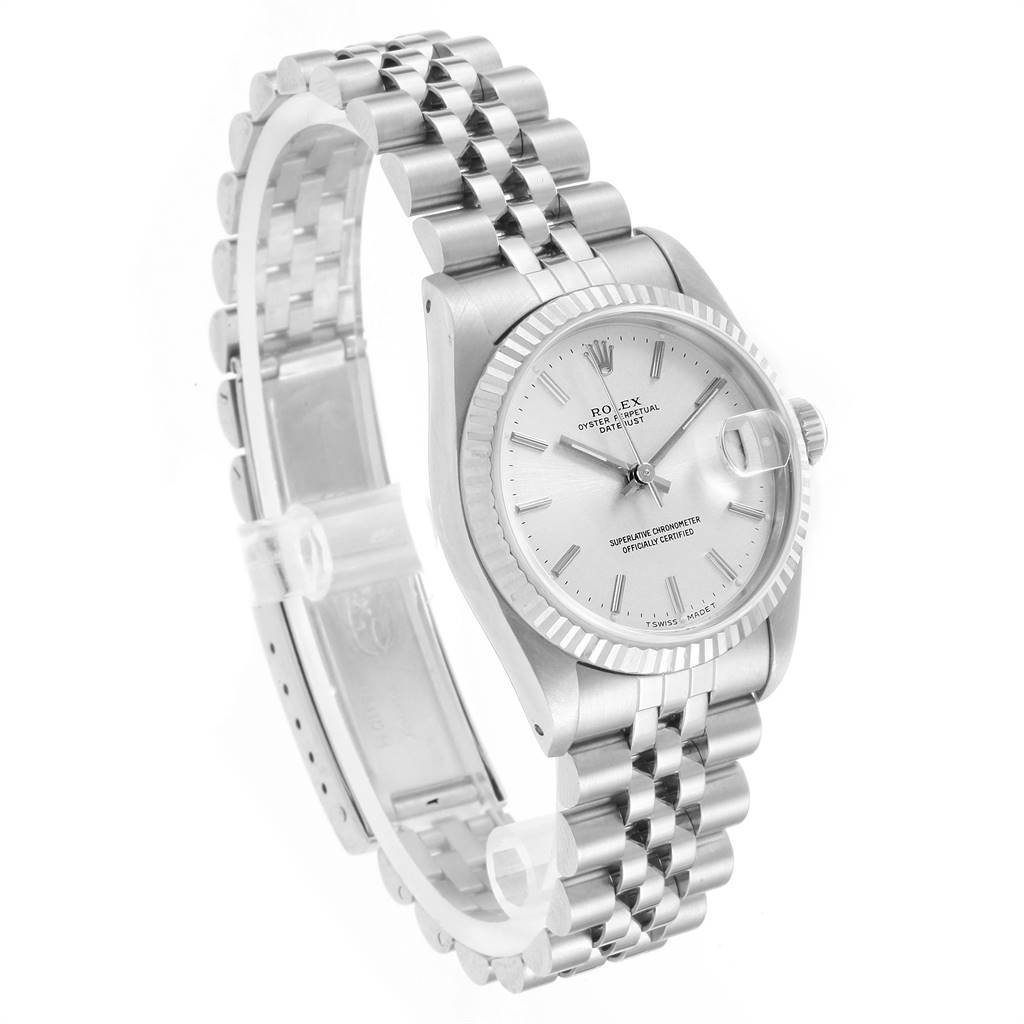 The Rolex Mid-Size 68274 Women's Stainless Steel Silver Dial 68274 Women's Stainless Steel Silver Dial watch is shown in a three-quarter angle, highlighting its silver dial, Jubilee bracelet, and fluted bezel.