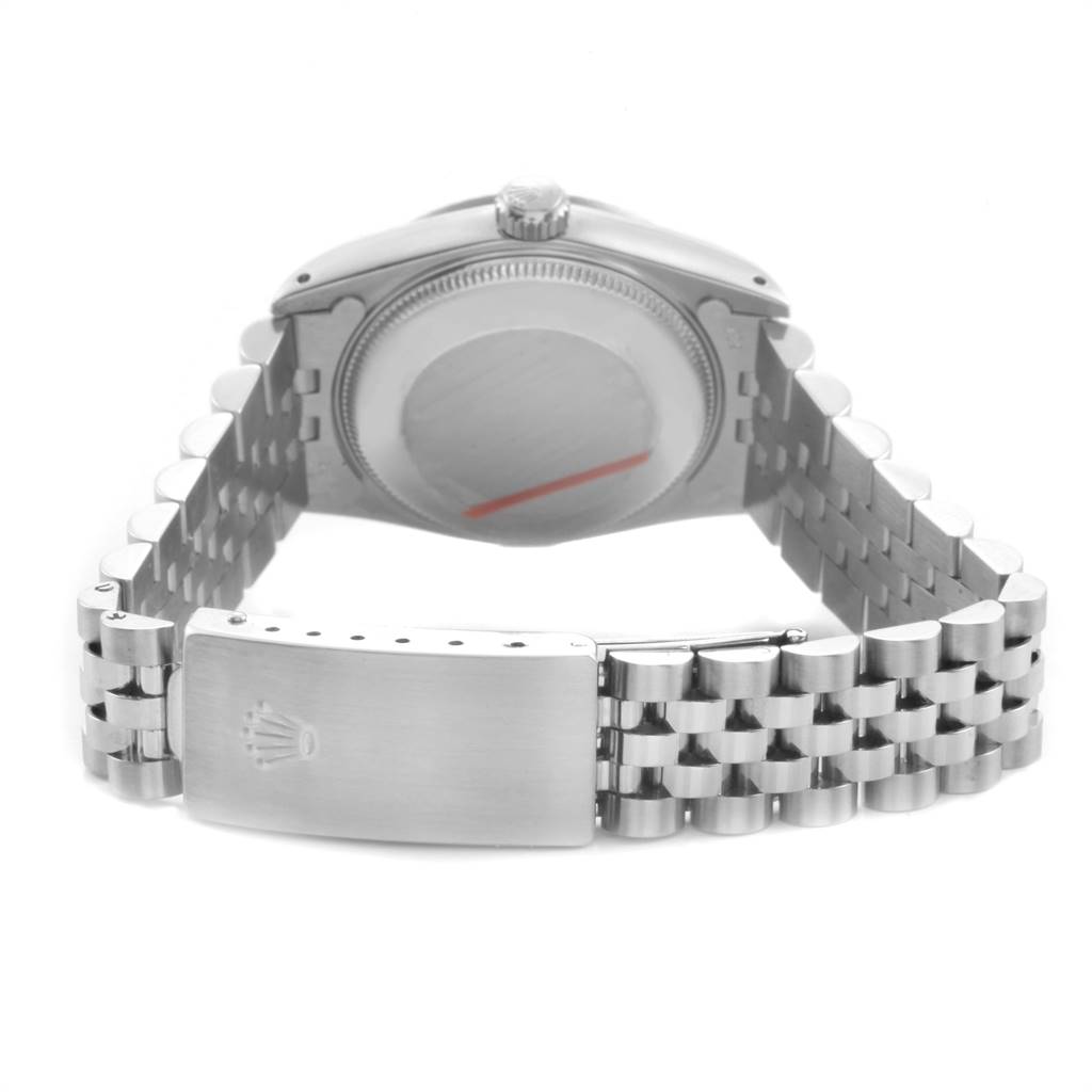 The image shows the back view of a Mid-Size Rolex watch, displaying the case back and folded clasp bracelet.