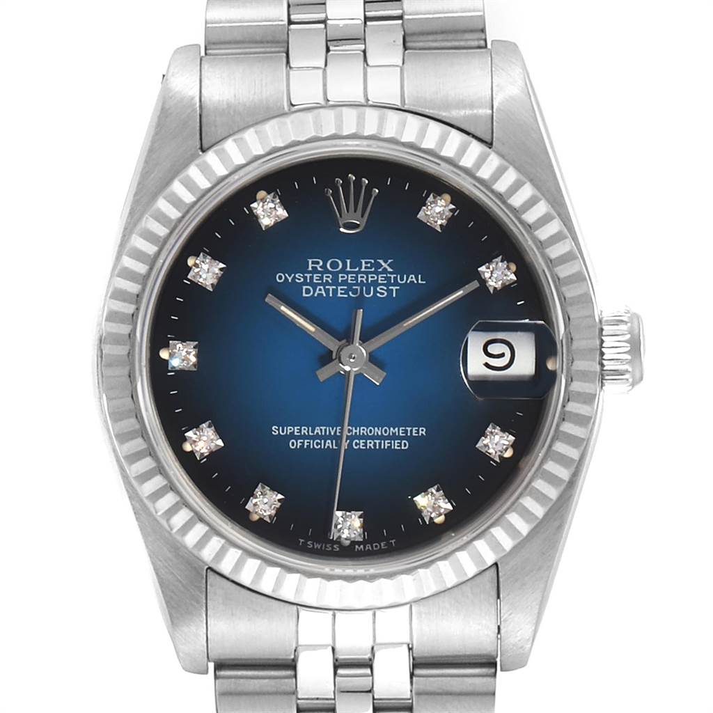 The watch is shown from a front angle, displaying the face, crown, and part of the bracelet of the Rolex Mid-Size 68274 Women's Stainless Steel Blue Dial 68274 Women's Stainless Steel Blue Dial Datejust model.