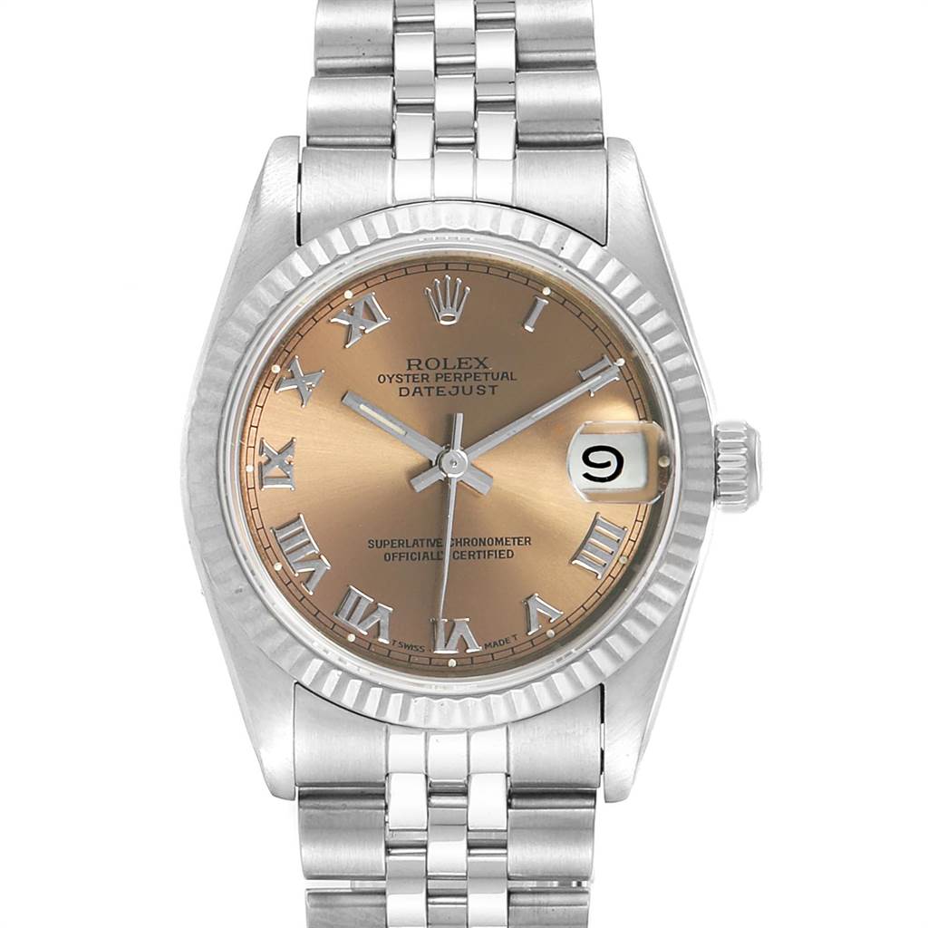 The image shows a frontal view of a Rolex Oyster Perpetual Datejust Mid-Size watch, highlighting the dial, fluted bezel, and bracelet.