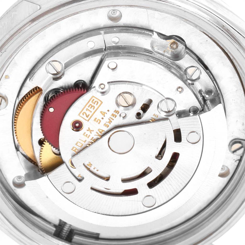 This image shows the internal movement mechanism of a Rolex Mid-Size 68274 Women's Stainless Steel Pink Dial 68274 Women's Stainless Steel Pink Dial model from a close-up angle.