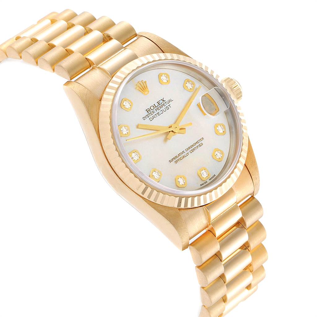 This Rolex Mid-Size 68278 Women's Yellow Gold Mother of Pearl Dial 68278 Women's Yellow Gold Mother of Pearl Dial model is angled to show the dial, fluted bezel, and part of the bracelet.