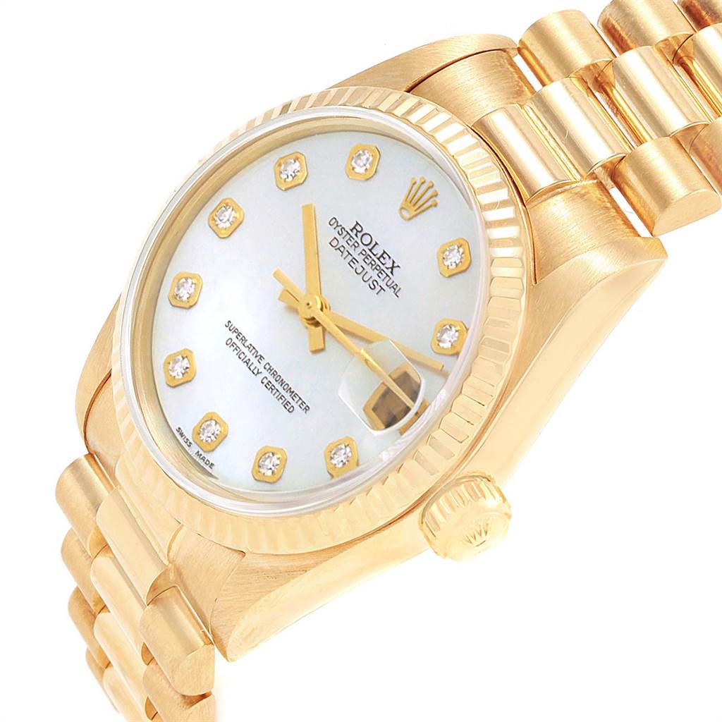 The Rolex Mid-Size 68278 Women's Yellow Gold Mother of Pearl Dial 68278 Women's Yellow Gold Mother of Pearl Dial watch is shown at a slightly angled top-down view, highlighting the face, bezel, crown, and part of the bracelet.