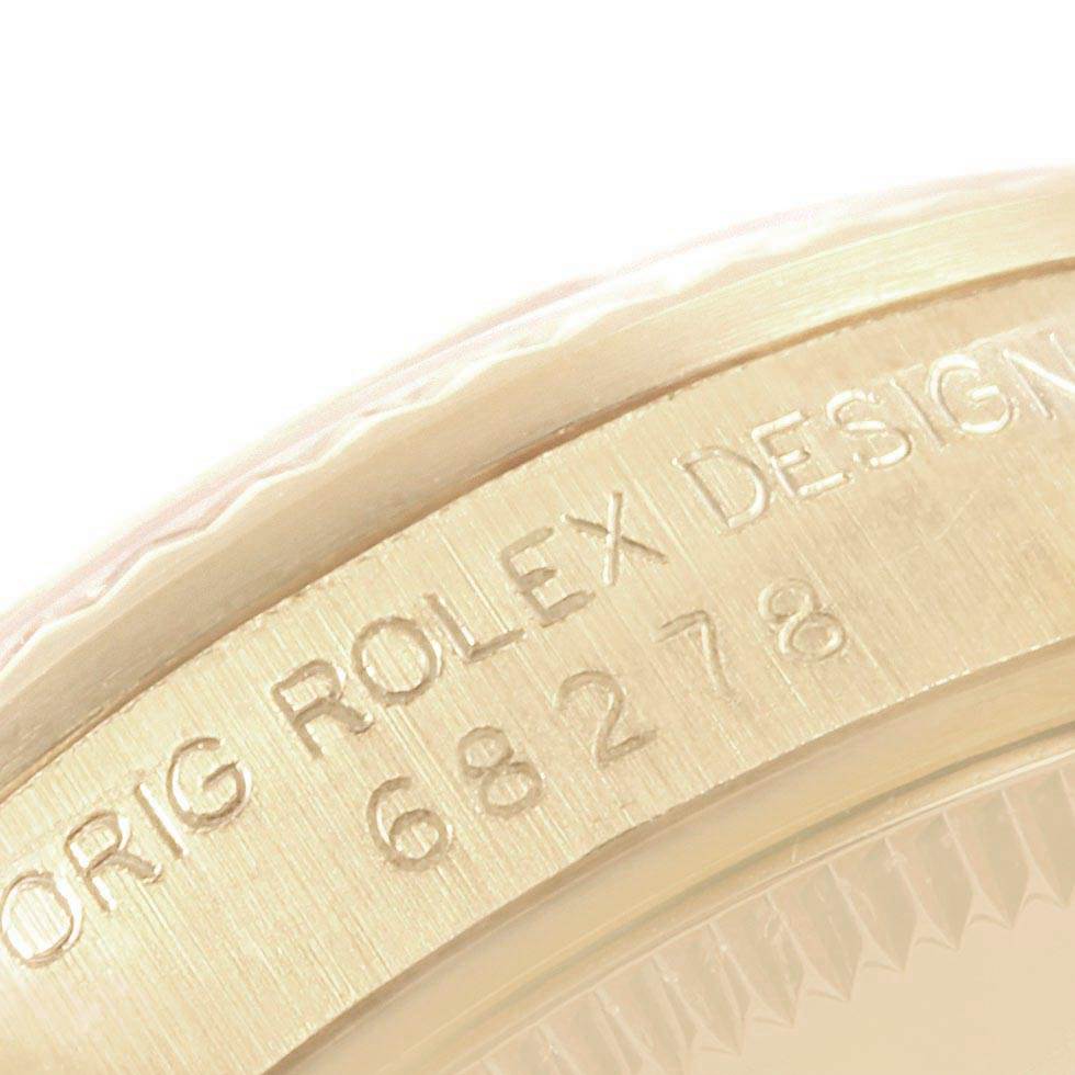This close-up image shows the engraving on the case side of a Mid-Size model by Rolex.