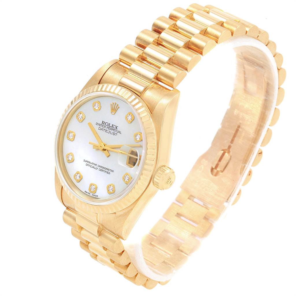 The image shows a Rolex Mid-Size 68278 Women's Yellow Gold Mother of Pearl Dial 68278 Women's Yellow Gold Mother of Pearl Dial Datejust watch displaying the dial, crown, and bracelet at an oblique angle.