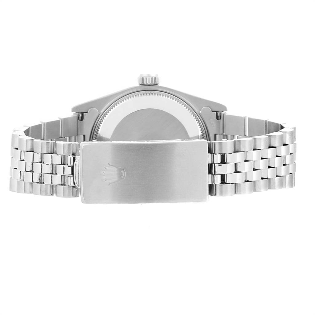 The image shows the back view of a Rolex Mid-Size 68274 Women's Stainless Steel Silver Dial 68274 Women's Stainless Steel Silver Dial model watch, highlighting the case back and metal bracelet with clasp.