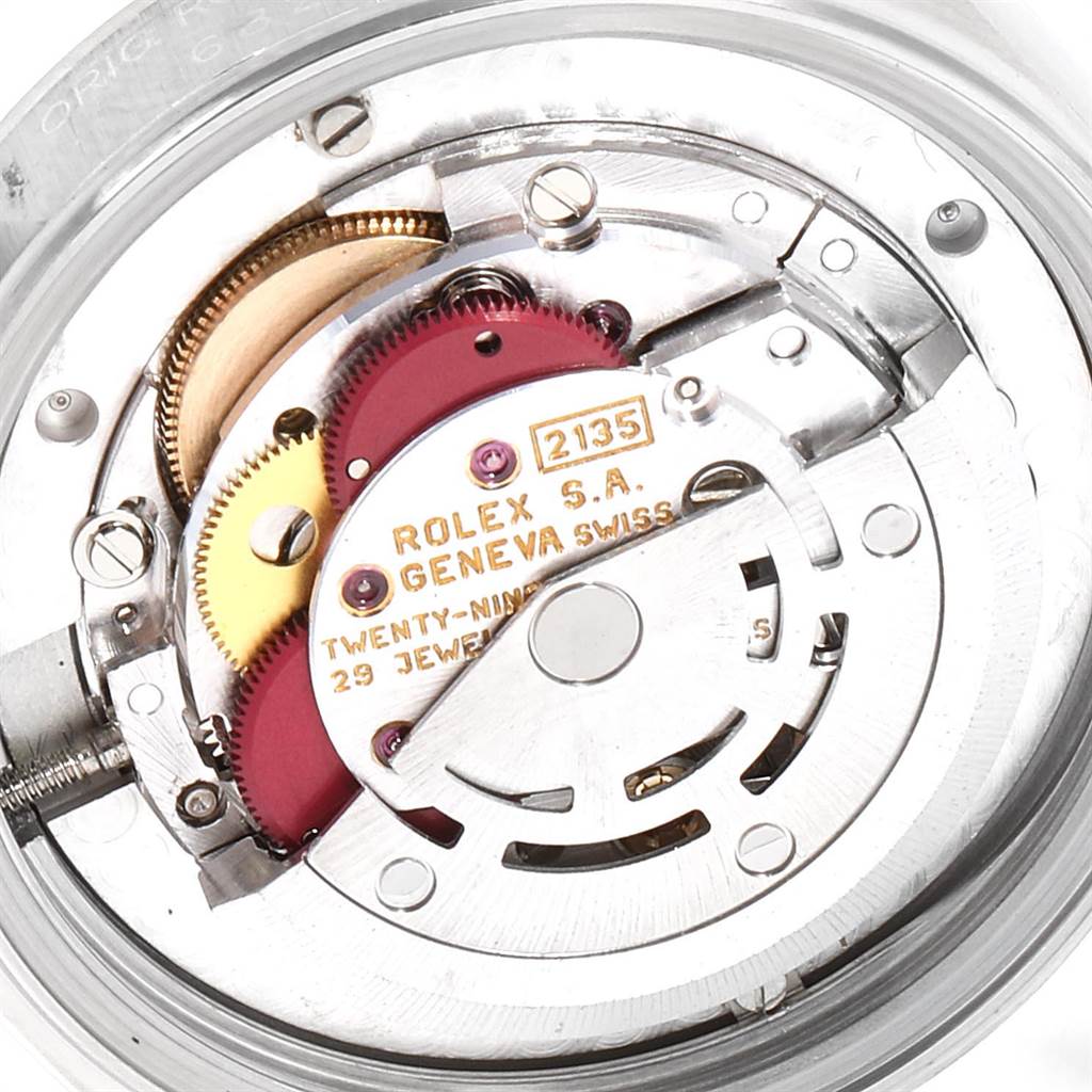 This image shows a close-up view of the movement mechanism of a mid-size Rolex watch model 2135.