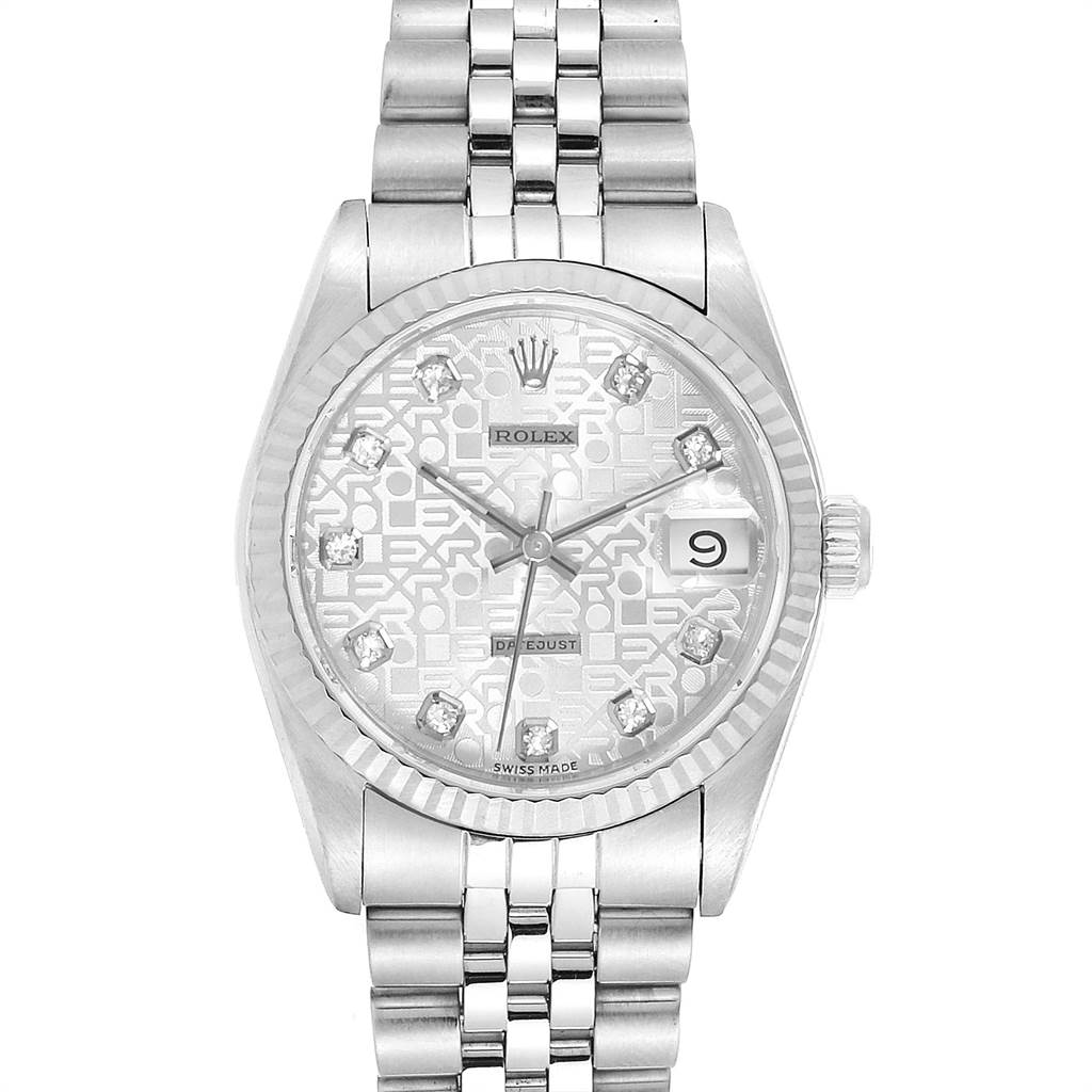 This image shows a Rolex Mid-Size 68274 Women's Stainless Steel Silver Dial 68274 Women's Stainless Steel Silver Dial model watch, featuring the face, bezel, bracelet, and date window, taken from a top-down angle.