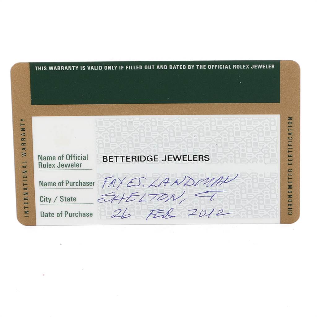 The image shows the warranty card of a Mid-Size Rolex watch, including details of the official jeweler and purchase date.