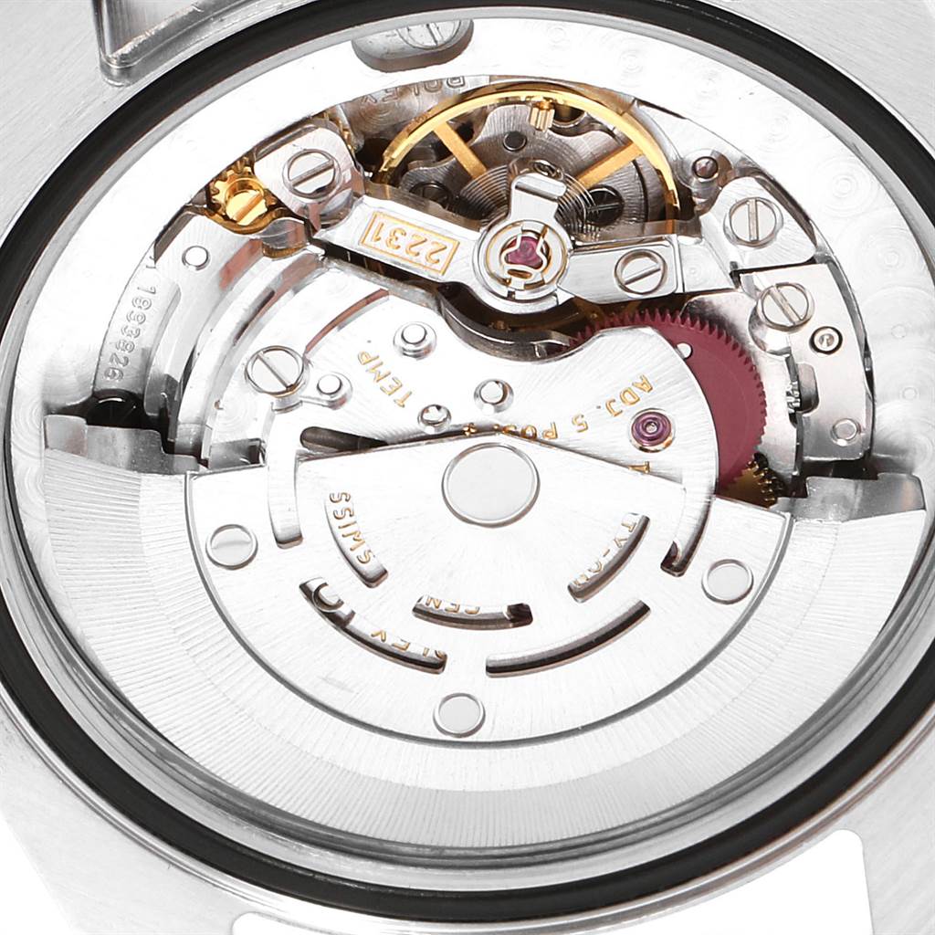 This image shows the internal mechanical movement of a Mid-Size Rolex watch, viewed from the back.