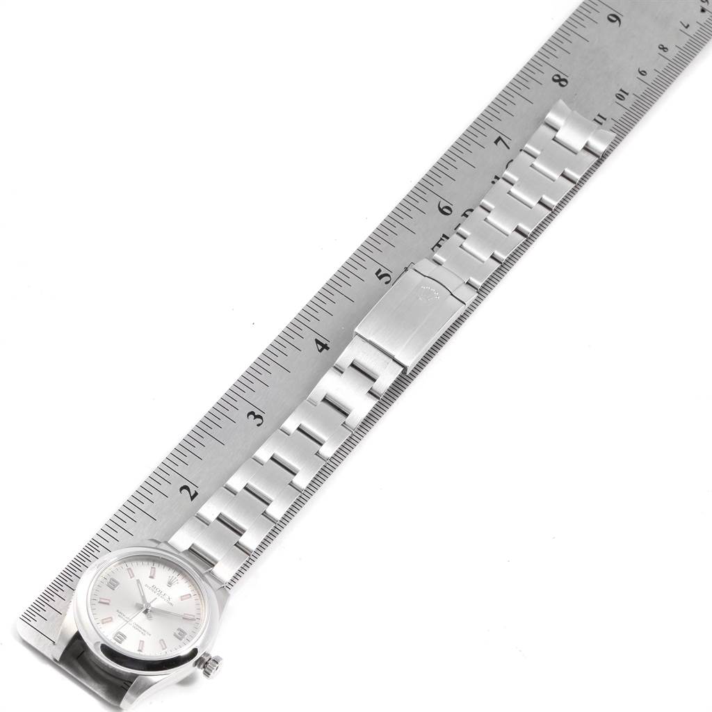 This image shows a Rolex Mid-Size 177200 Women's Stainless Steel Silver Dial 177200 Women's Stainless Steel Silver Dial watch with a measurement ruler, highlighting the length of its bracelet.