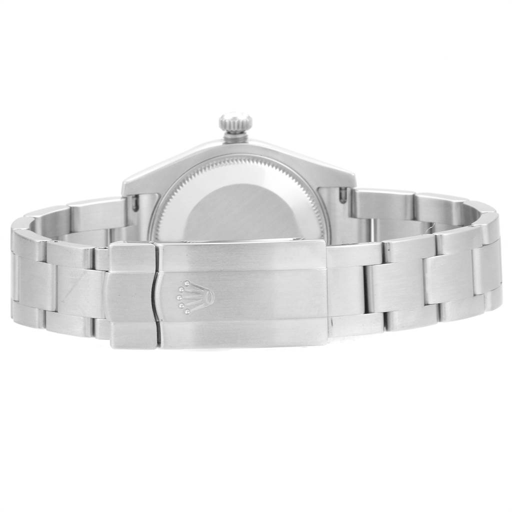 This is a rear view of a Mid-Size Rolex watch showing the case back, winding crown, and bracelet with the clasp.
