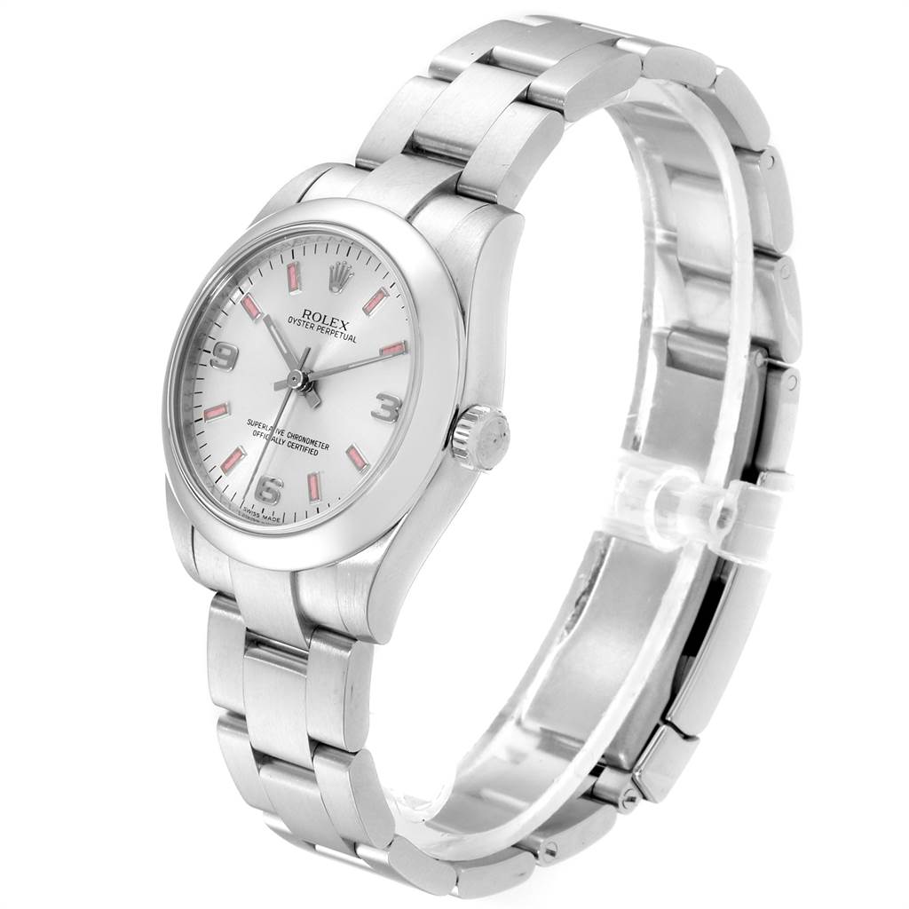 This Rolex Mid-Size 177200 Women's Stainless Steel Silver Dial 177200 Women's Stainless Steel Silver Dial Oyster Perpetual watch is shown at a 3/4 angle, displaying the face, bezel, bracelet, and crown.