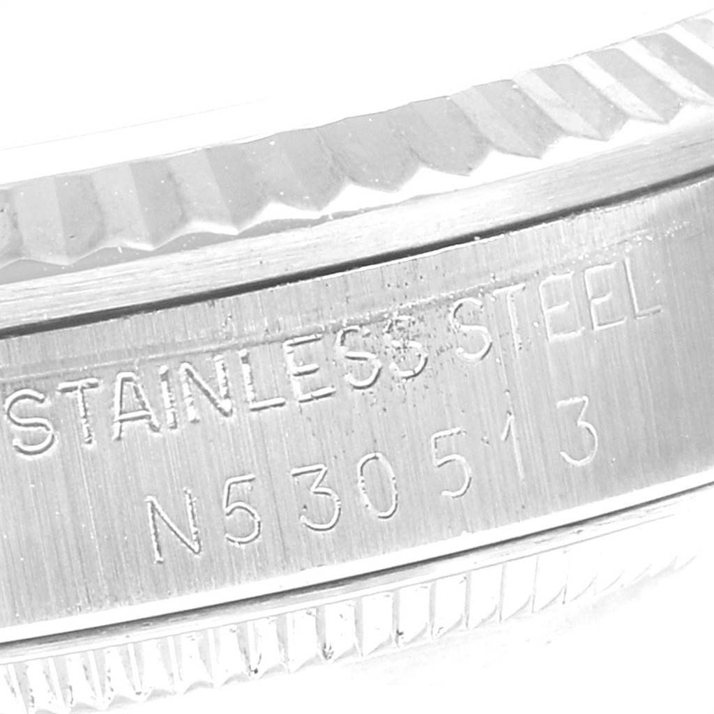 This image displays a close-up of the stainless steel mid-case side of a Rolex Mid-Size 68274 Women's Stainless Steel Silver Dial 68274 Women's Stainless Steel Silver Dial watch.