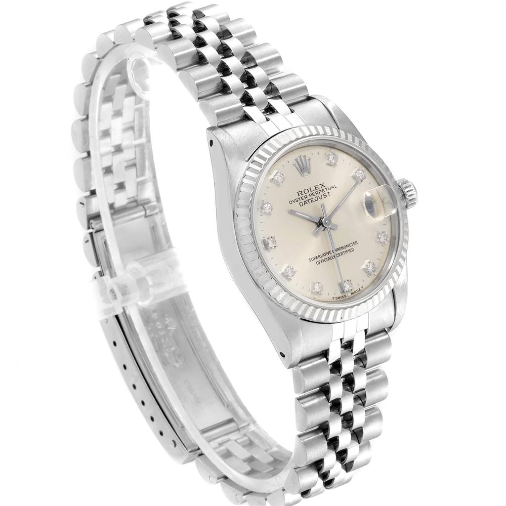 The image shows a Mid-Size Rolex Oyster Perpetual Datejust watch from a front angle, highlighting the dial, bezel, and bracelet.