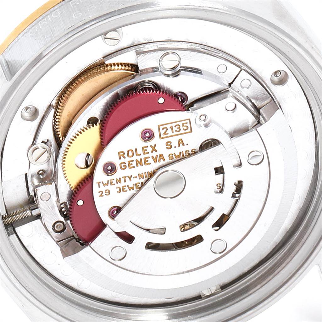 The image shows the internal mechanism of a Rolex Mid-Size 68273 Women's Steel and Gold (two tone) Champagne Dial 68273 Women's Steel and Gold (two tone) Champagne Dial model watch from the back.
