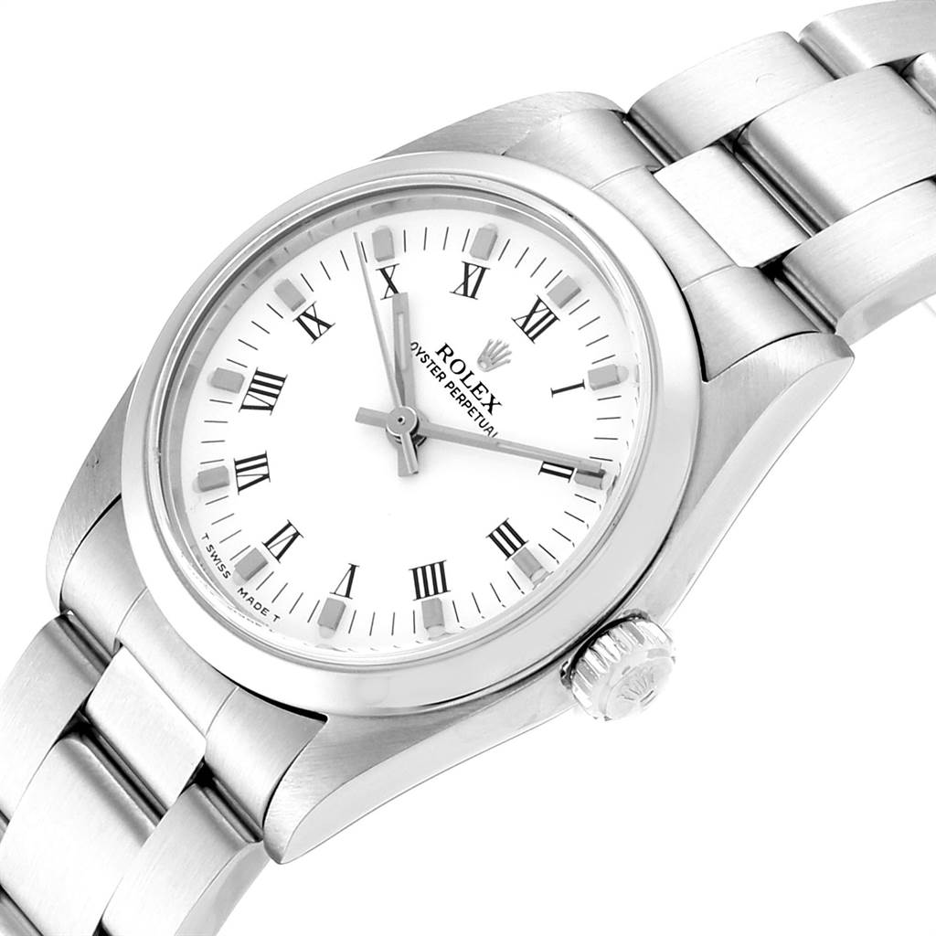 The image shows a Rolex Mid-Size 77080 Women's Stainless Steel White Dial 77080 Women's Stainless Steel White Dial Oyster Perpetual watch, highlighting the face, bezel, crown, and part of the bracelet, viewed from a slight angle.