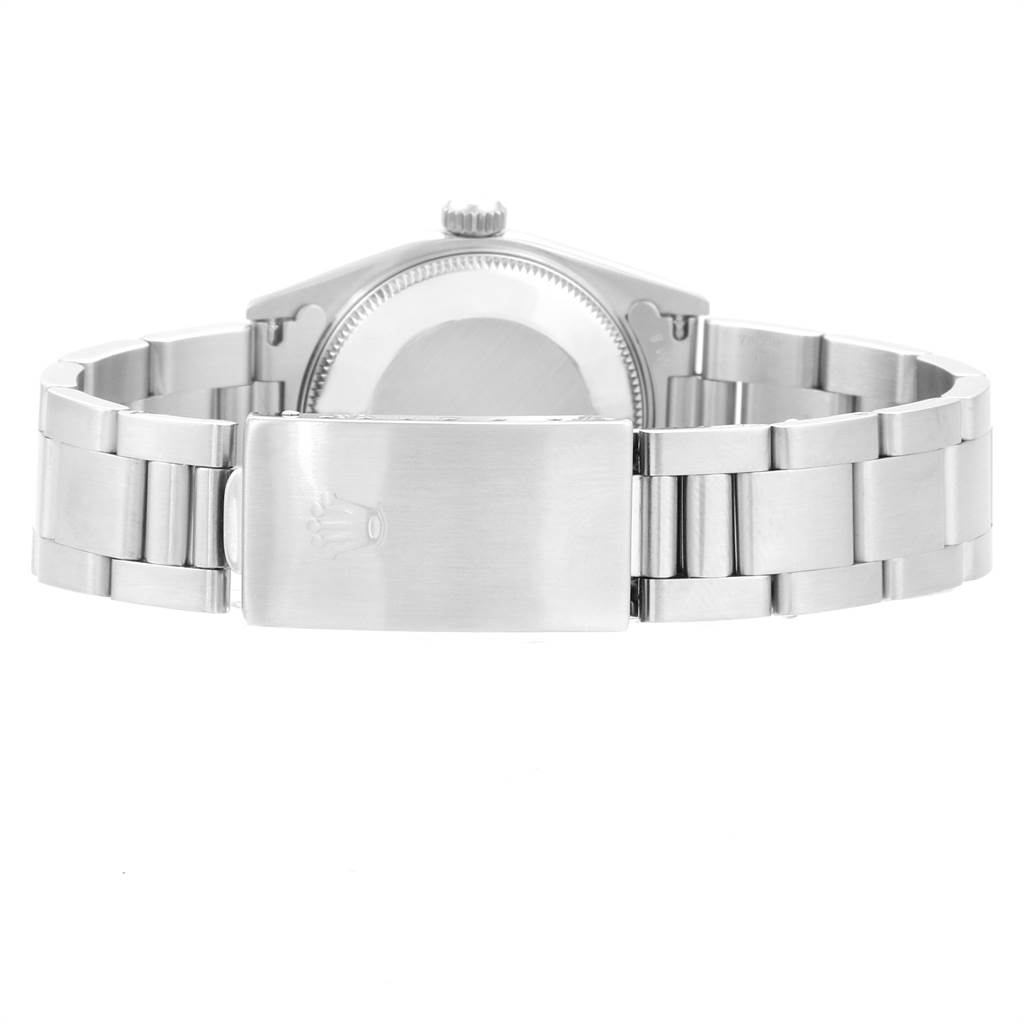 The image shows the back view of a Rolex Mid-Size 77080 Women's Stainless Steel White Dial 77080 Women's Stainless Steel White Dial model watch, highlighting the clasp and case back.