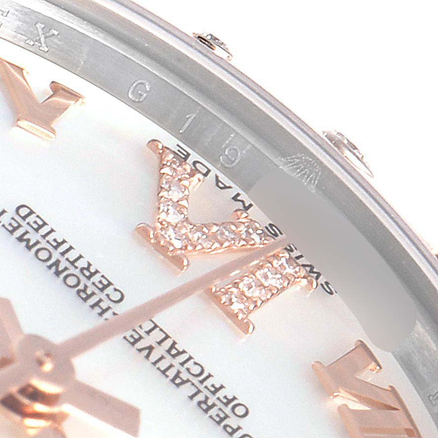 The image shows a close-up of the Rolex Mid-Size 178341 Women's Steel and Gold (two tone) Mother of Pearl Dial 178341 Women's Steel and Gold (two tone) Mother of Pearl Dial model watch dial, including diamond-set Roman numerals and a portion of the hands.