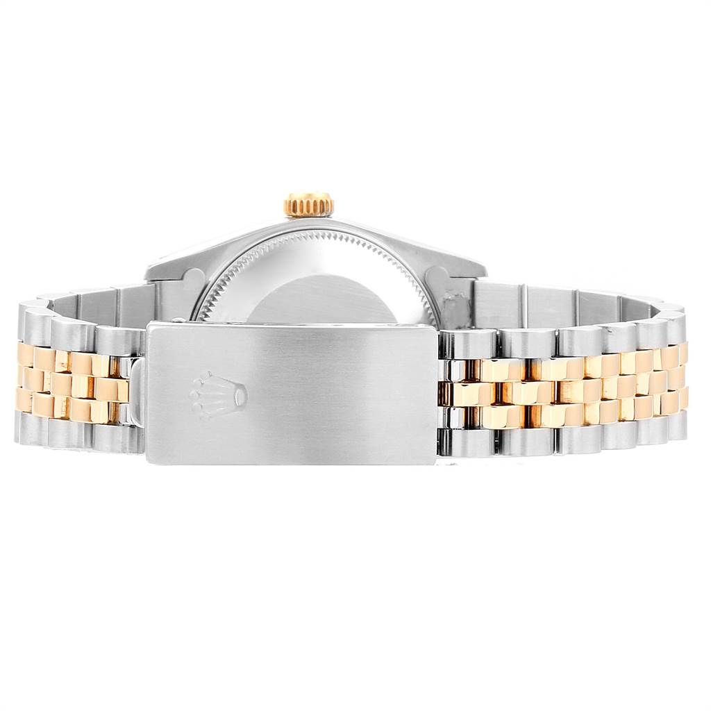 The image shows the back view of a Rolex Mid-Size 68273 Women's Steel and Gold (two tone) Black Dial 68273 Women's Steel and Gold (two tone) Black Dial model watch, highlighting the clasp and bracelet.