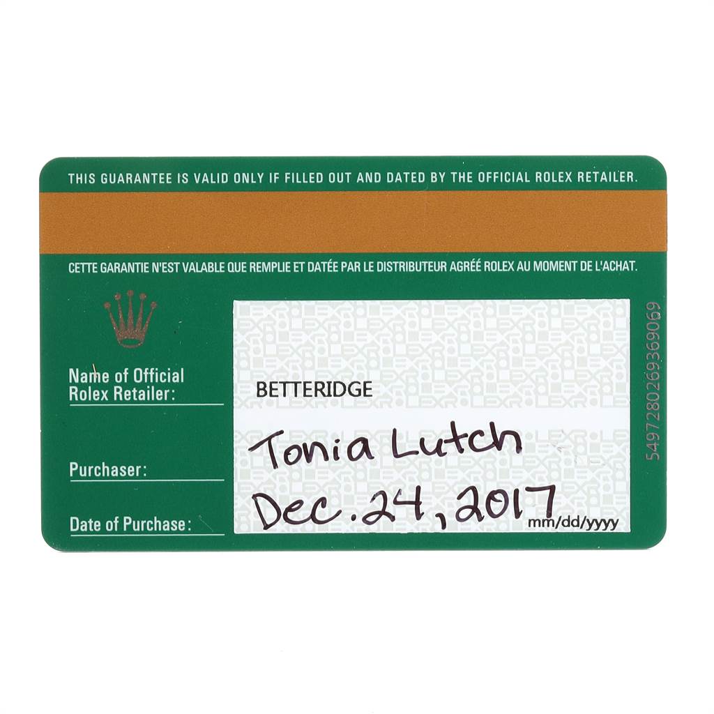 This is the warranty card of a Mid-Size Rolex watch, shown flat and displaying the retailer and purchaser details.