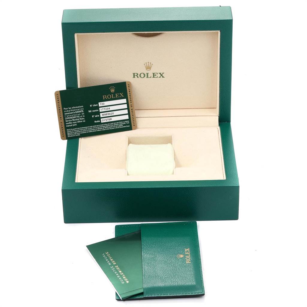 The image shows a Rolex Mid-Size 177234 Women's Stainless Steel Blue Dial 177234 Women's Stainless Steel Blue Dial model watch box, warranty card, a cushion, and booklets.