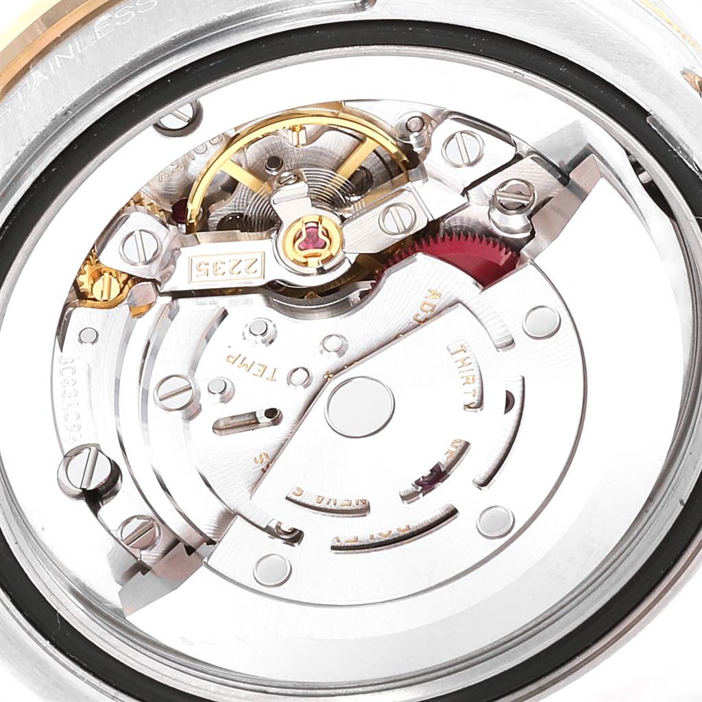 This image shows the movement mechanism of the Mid-Size Rolex watch from a back angle.