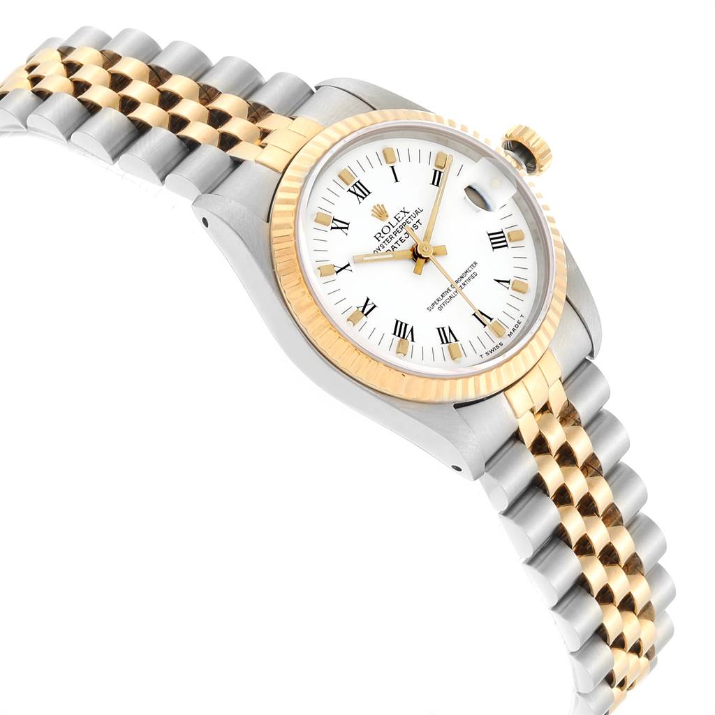 The image shows a side angle of a Rolex Mid-Size 68273 Women
s Steel and Gold (two tone) White Dial 68273 Women
s Steel and Gold (two tone) White Dial watch, highlighting its gold and silver bracelet and white dial.