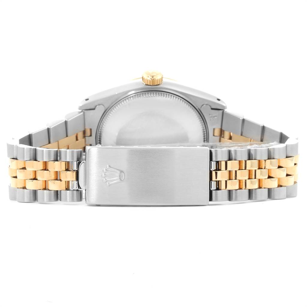 The image shows the back of a Mid-Size Rolex watch, focusing on the case back, crown, and two-tone bracelet with clasp.