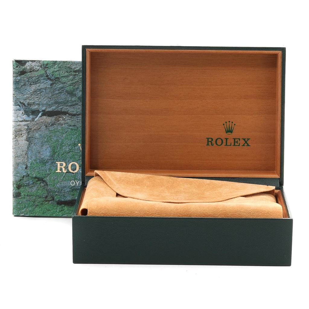 The image shows a Rolex box and suede pouch for a Mid-Size model watch, both partially open and empty.