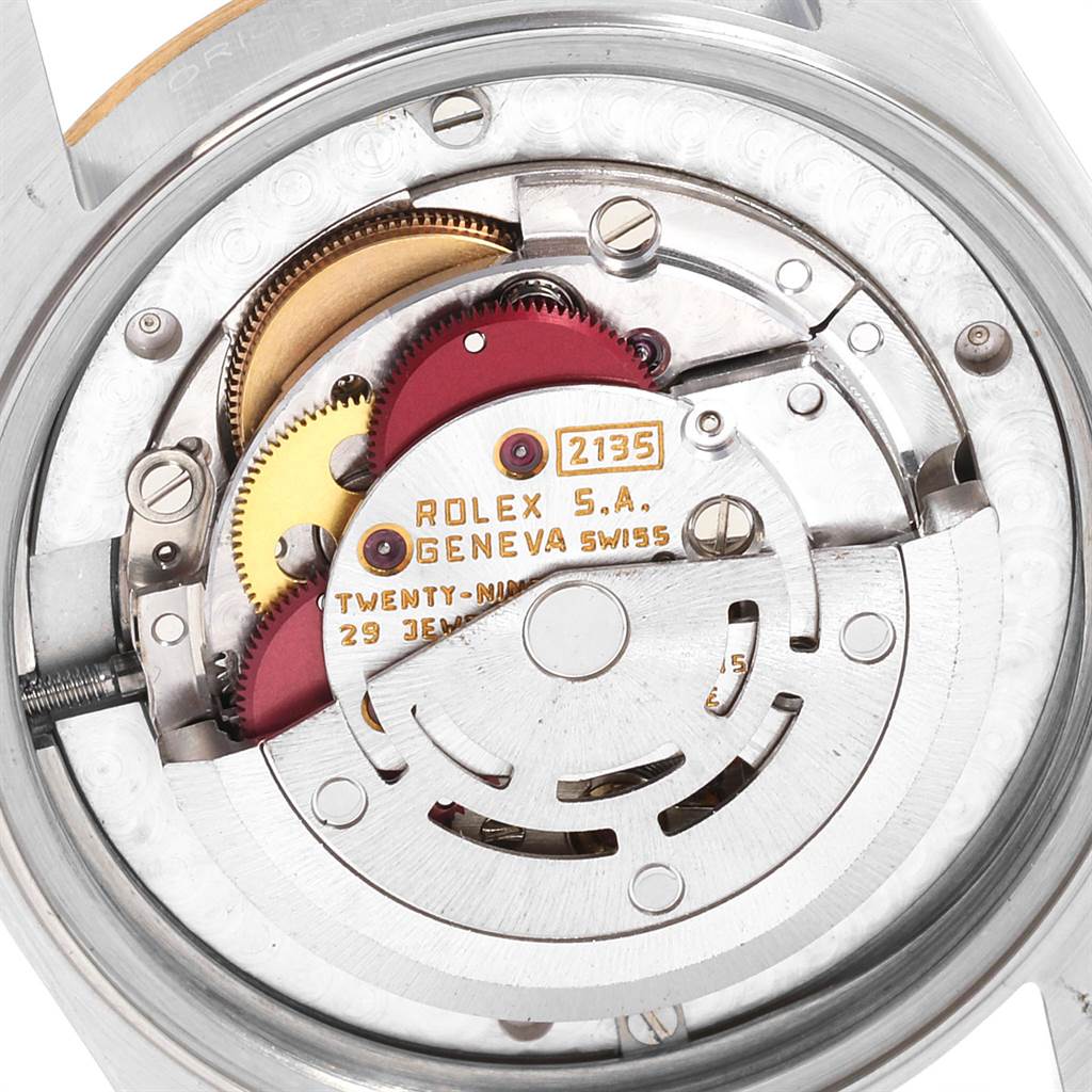 The image shows the internal movement mechanism of a Rolex Mid-Size 68273 Steel and Gold (two tone) Blue Dial 68273 Steel and Gold (two tone) Blue Dial watch model 2135.