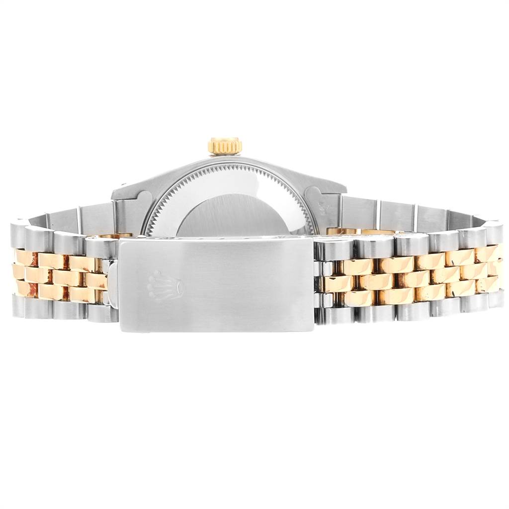 This image shows the back of a Rolex Mid-Size 68273 Women's Steel and Gold (two tone) Black Dial 68273 Women's Steel and Gold (two tone) Black Dial watch, displaying its case back, crown, and two-tone metal bracelet.