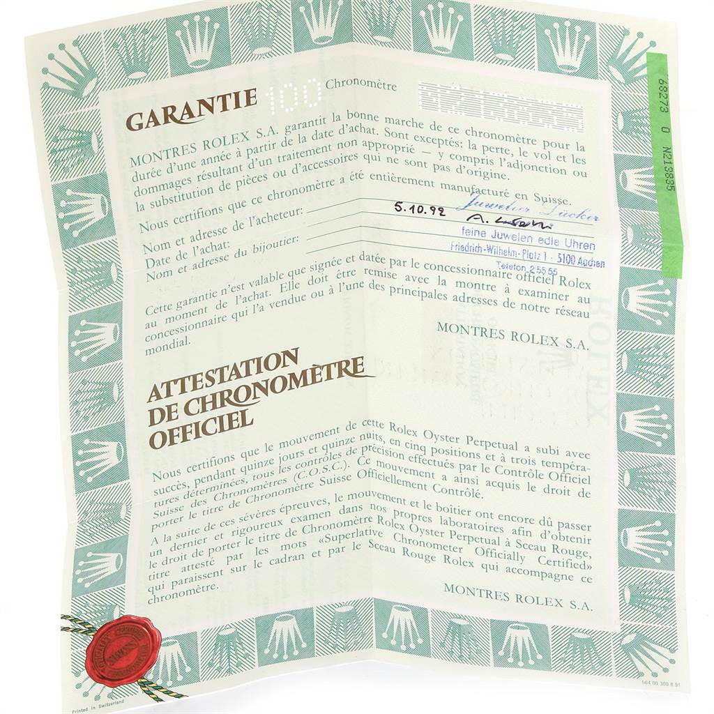 This is a warranty certificate for a Rolex Mid-Size 68273 Women's Steel and Gold (two tone) Black Dial 68273 Women's Steel and Gold (two tone) Black Dial model watch.