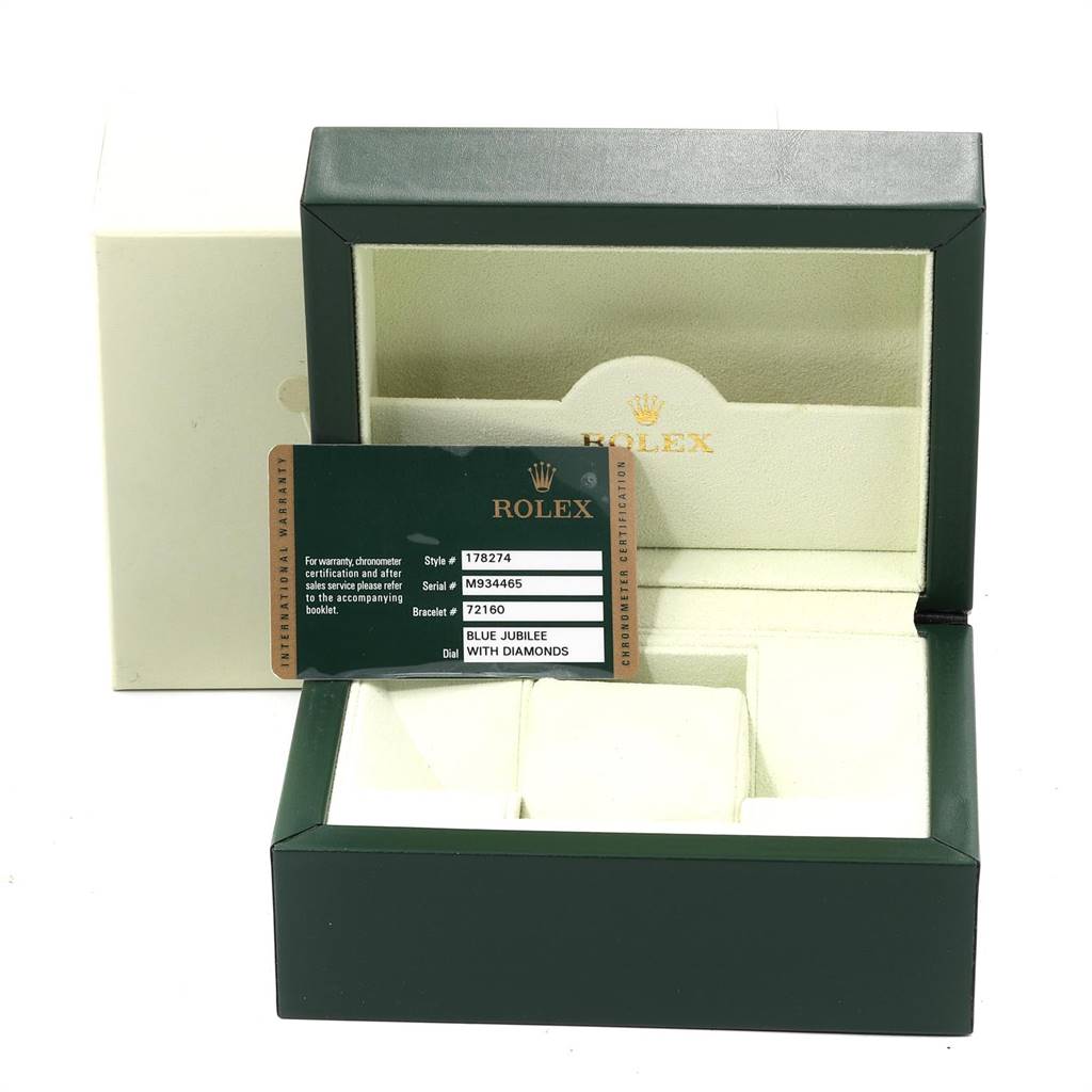 This image shows the open box and certification card for a mid-size Rolex watch.