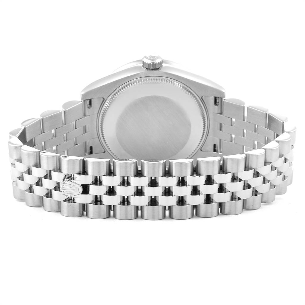 The image shows the back view of the mid-size Rolex watch, focusing on the case back and Jubilee bracelet.
