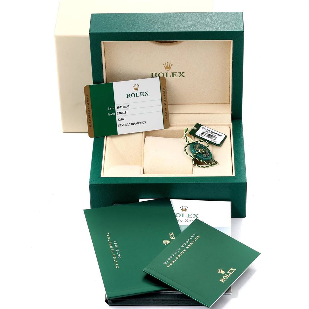 The image shows a Rolex Mid-Size 178313 Women's Stainless Steel Silver Dial 178313 Women's Stainless Steel Silver Dial watch box and accessories, including the warranty card, tags, and manuals, all displayed at an angled view.