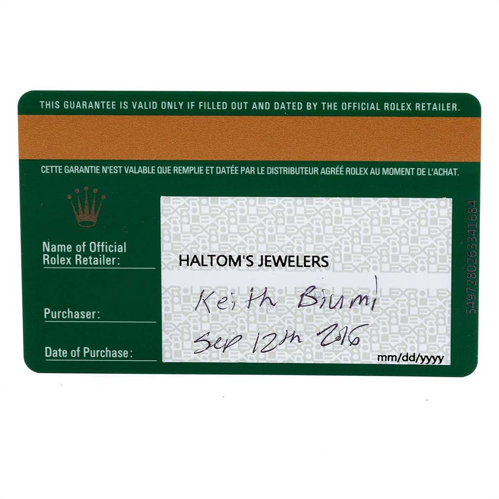 This image shows a guarantee card from Rolex, including retailer and purchase details for a Mid-Size model.