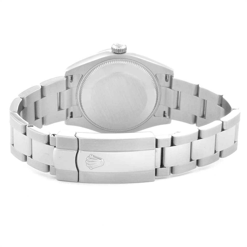 This image shows the back and clasp of a Mid-Size Rolex watch, revealing the bracelet and case back.