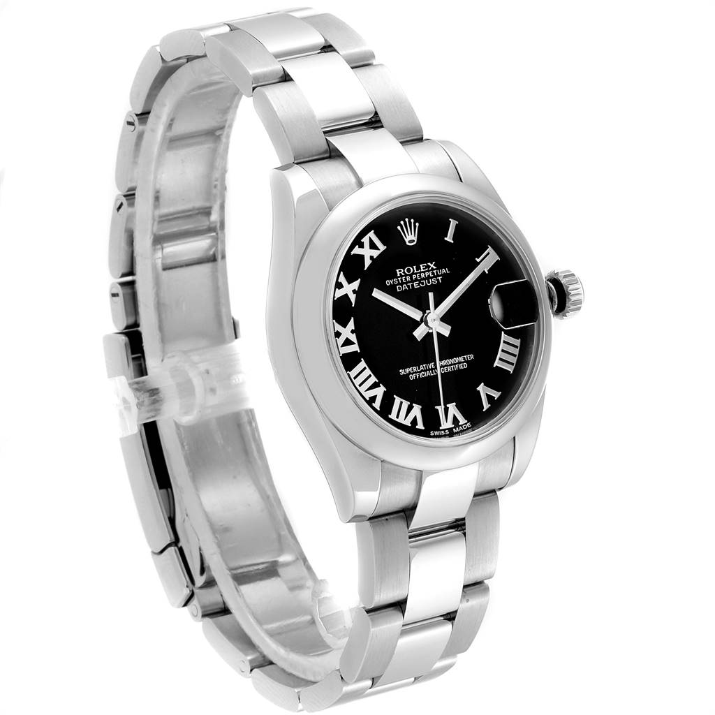 The image shows a Mid-Size Rolex Oyster Perpetual Datejust, angled to display the face, bracelet, and crown.